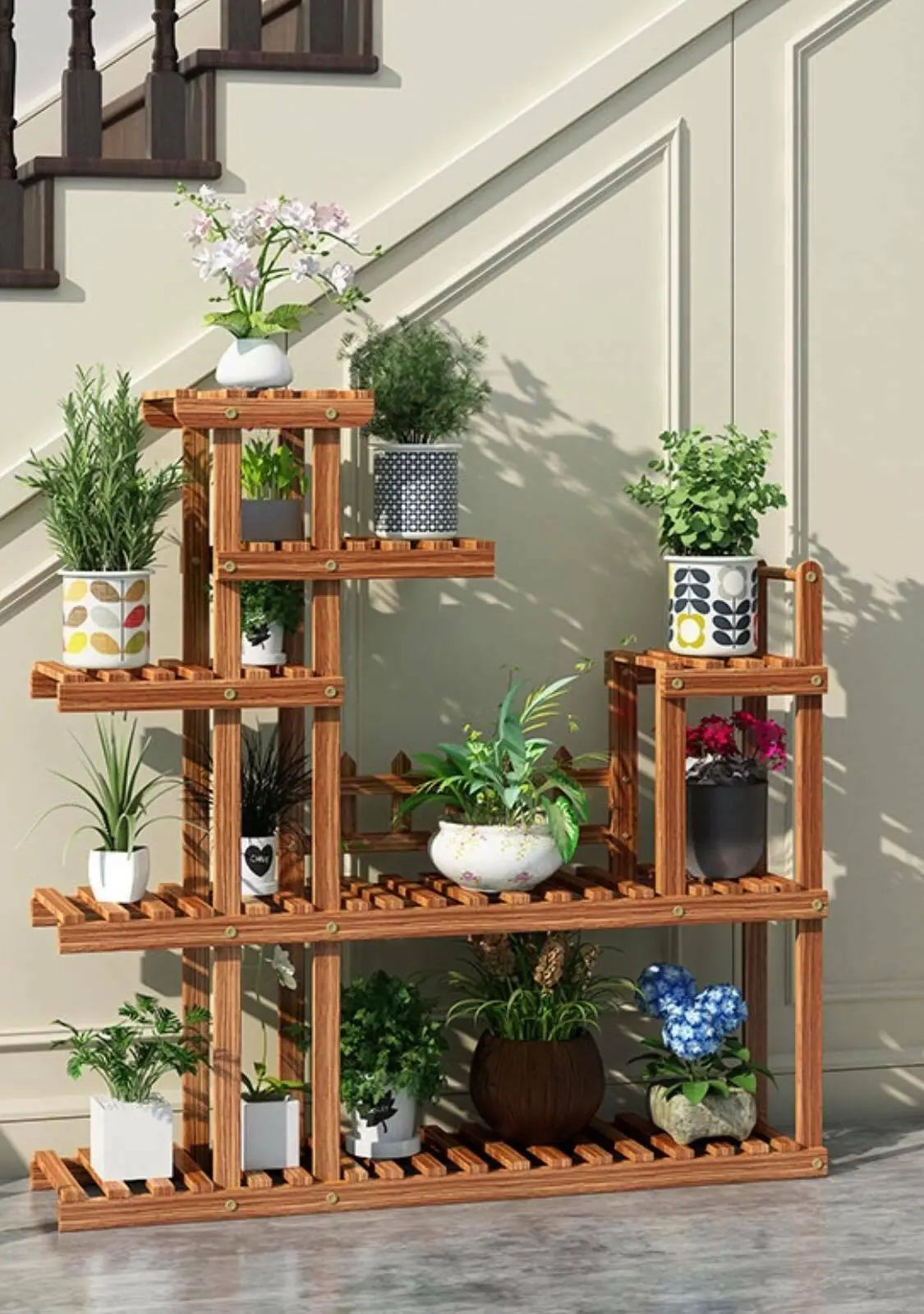 Premium Photo | Decorative indoor plants on wooden ladder and industrial  wood and metal stool
